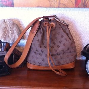 Dooney & Bourke Drawstring Canvas & Leathe…